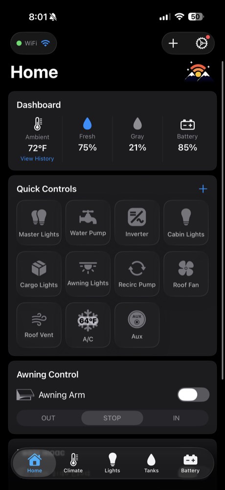 ModeBRIDGE app home screen showing ambient temperature, fresh and gray tank levels, battery percentage, and quick controls for lights, pumps, A/C and the roof fan.